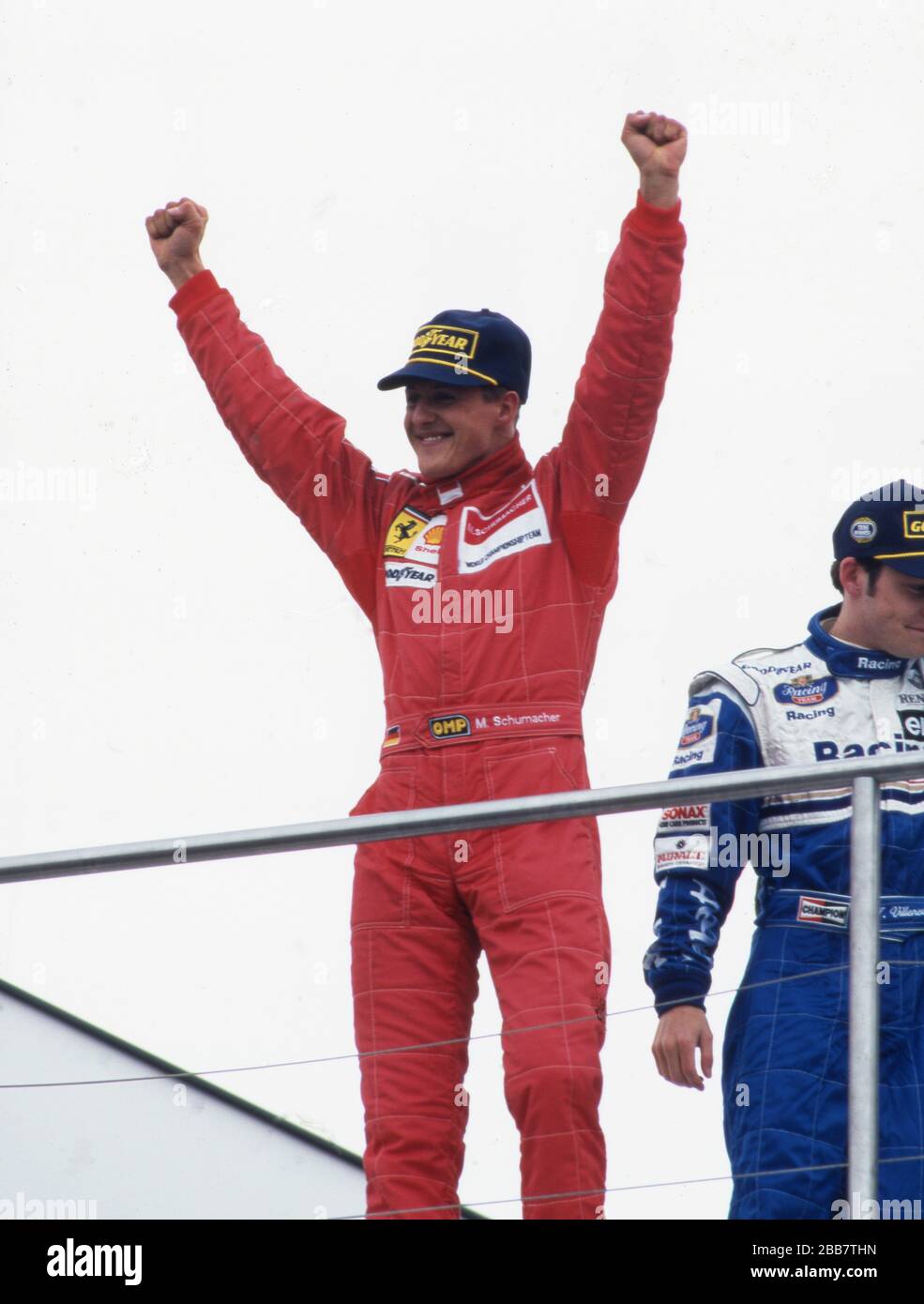 firo: Formula 1, season 1996 Sport, Motorsport, Formula 1, archive, archive pictures Team Ferrari (1996-2006) Michael Schumacher, Germany, was a Formula 1 driver from 1991 to 2006 and 2010 to 2012, Schumacher was 7, seven times, Formula 1, world champion, German national hero, brought Formula 1 after Germany, one of the largest Germans, 1st season at Ferrari Michael Schumacher, half figure, jubilation, cheering, gesture | usage worldwide Stock Photo