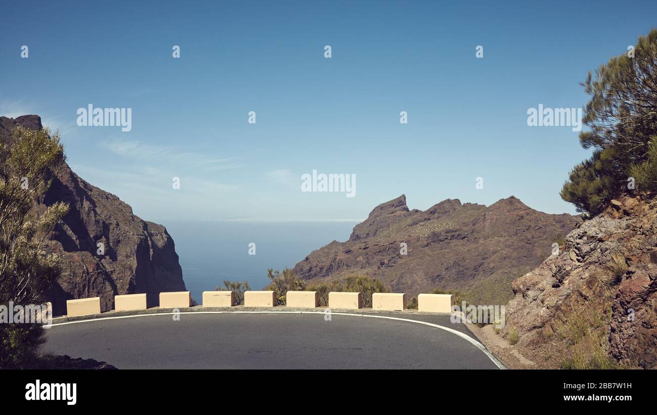 Scenic mountain road, retro style toned picture, Tenerife, Spain. Stock Photo