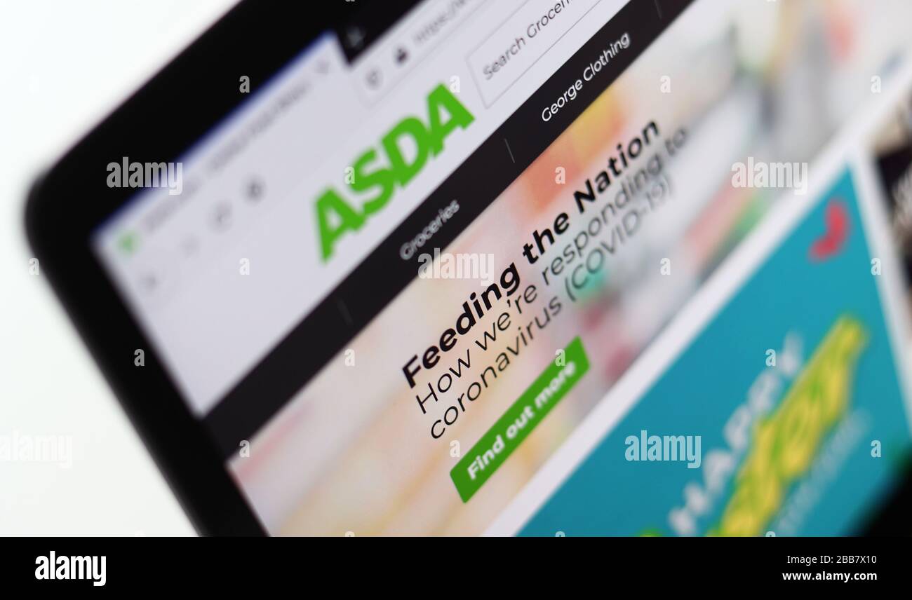 The ASDA website is pictured on a laptop as Supermarket websites are overwhelmed by online orders during the COVID-19 Coronavirus pandemic as the UK continues in lockdown to help curb the spread of the coronavirus. Stock Photo