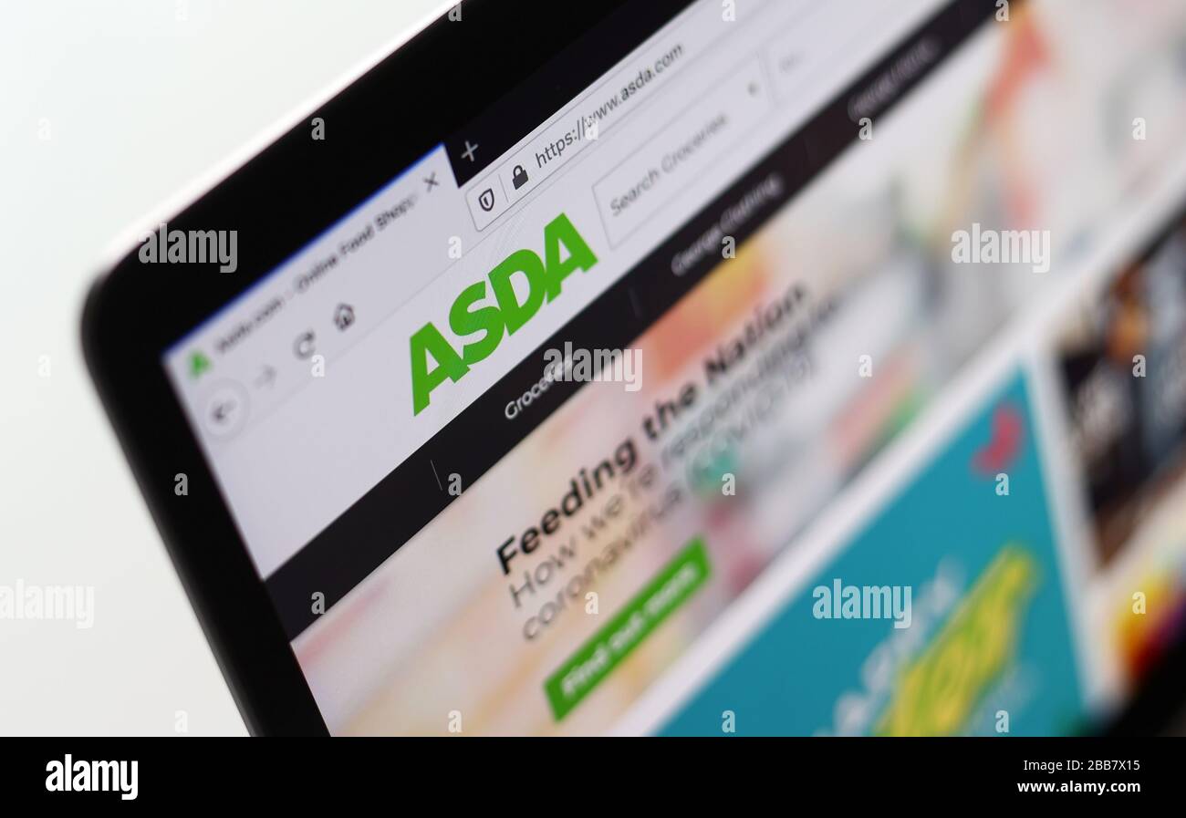 The ASDA website is pictured on a laptop as Supermarket websites are overwhelmed by online orders during the COVID-19 Coronavirus pandemic as the UK continues in lockdown to help curb the spread of the coronavirus. Stock Photo