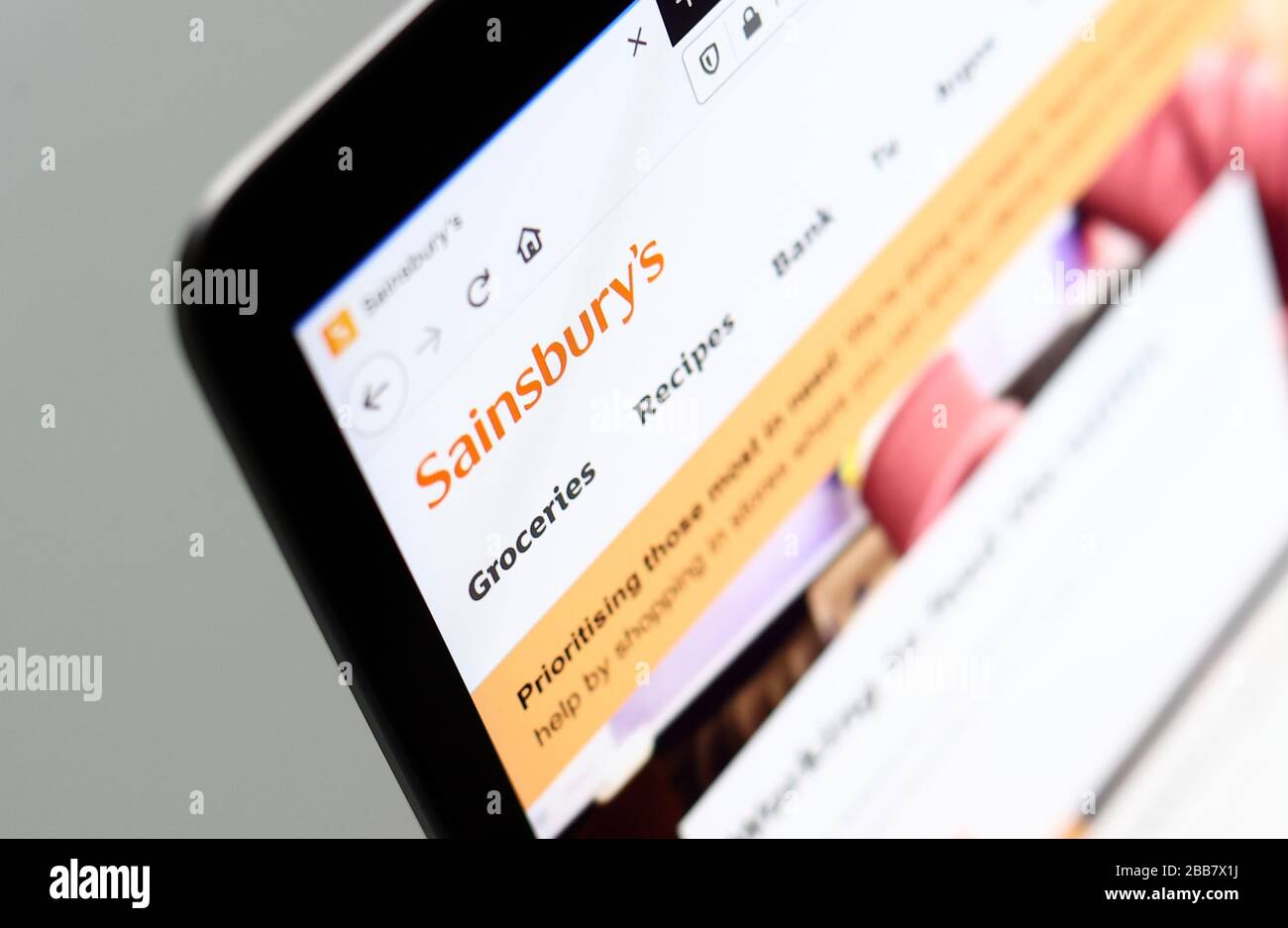 The Sainsbury's website is pictured on a laptop as Supermarket websites are overwhelmed by online orders during the COVID-19 Coronavirus pandemic as the UK continues in lockdown to help curb the spread of the coronavirus. Stock Photo