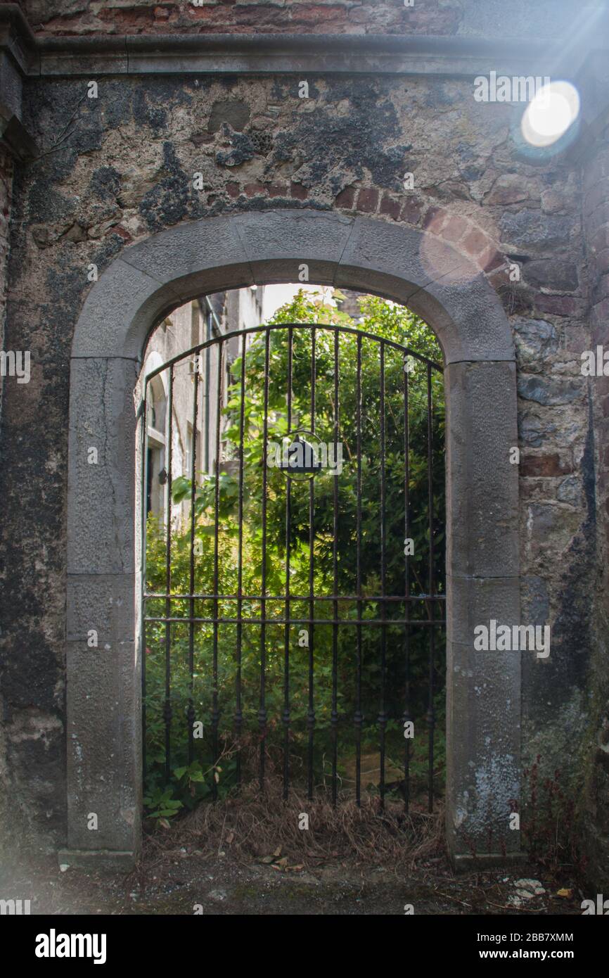 Howth, Ireland garden gate castle ruins Stock Photo