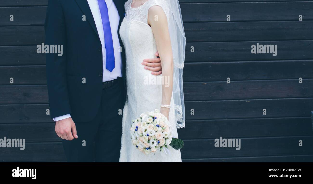 Portrait of a happy wedding couple outdoors Stock Photo - Alamy