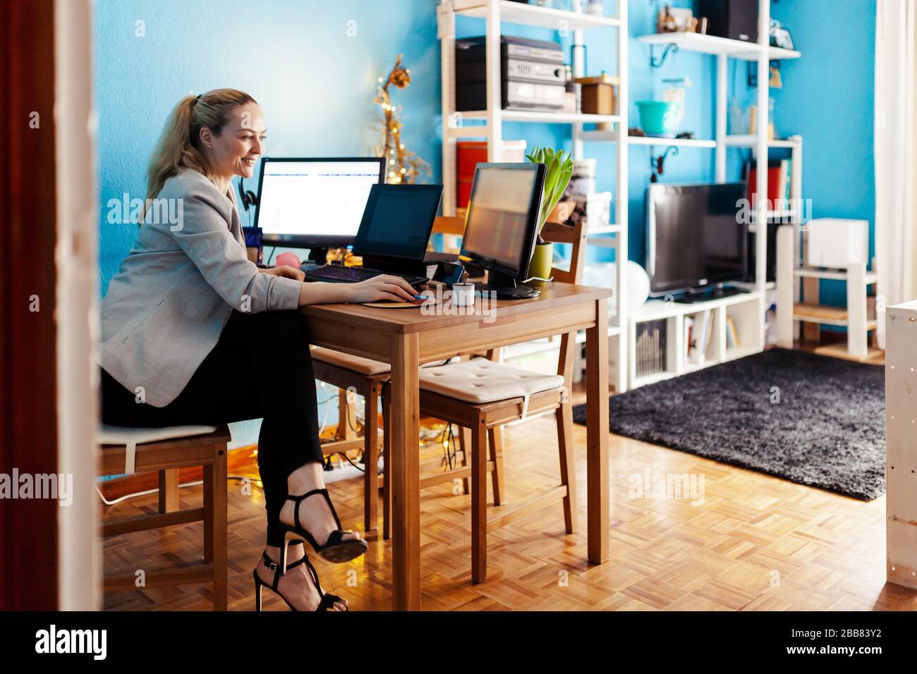 Woman teleworking at her house Stock Photo