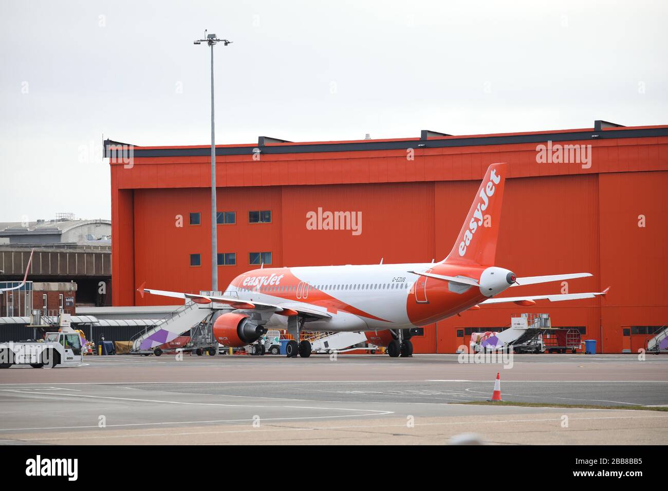 Luton, UK. 30th Mar, 2020. Day Six of Lockdown in the UK. easyJet planes grounded at Luton Airport. The country is on lockdown due to the COVID-19 Coronavirus pandemic. People are not allowed to leave home except for minimal food shopping, medical treatment, exercise - once a day, and essential work. COVID-19 Coronavirus lockdown, Luton, Bedfordshire, UK, on March 30, 2020 Credit: Paul Marriott/Alamy Live News Stock Photo