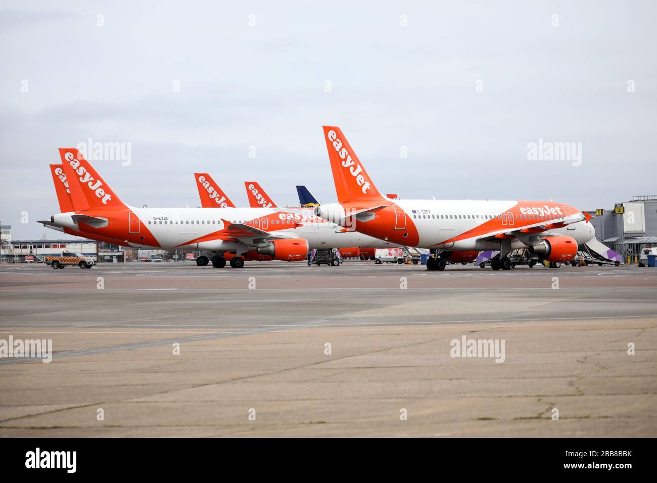 Luton, UK. 30th Mar, 2020. Day Six of Lockdown in the UK. easyJet planes grounded at Luton Airport. The country is on lockdown due to the COVID-19 Coronavirus pandemic. People are not allowed to leave home except for minimal food shopping, medical treatment, exercise - once a day, and essential work. COVID-19 Coronavirus lockdown, Luton, Bedfordshire, UK, on March 30, 2020 Credit: Paul Marriott/Alamy Live News Stock Photo
