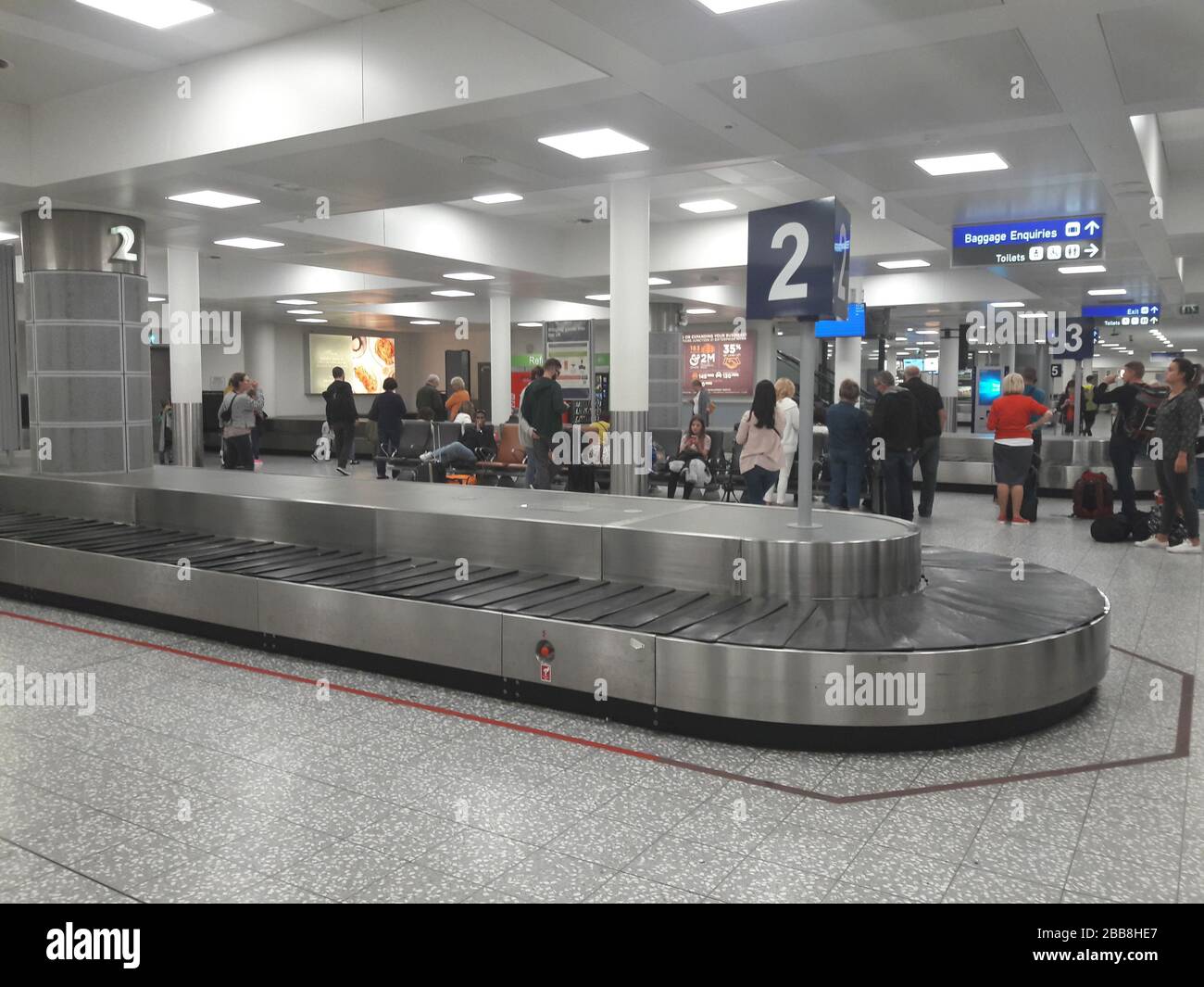 Baggage luggage claim area carousel conveyor belt hi-res stock ...