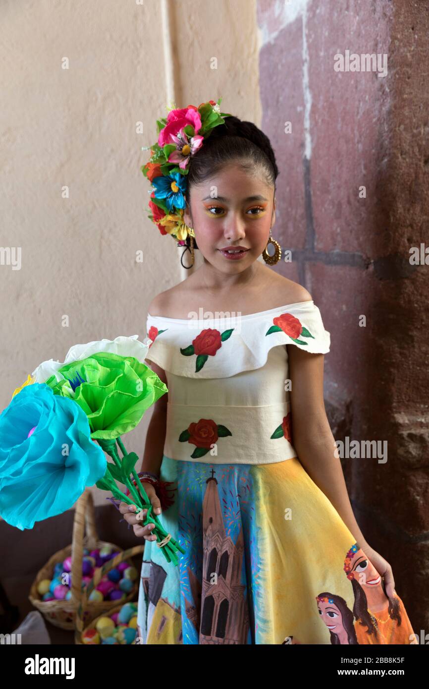 Mexico,  Guanajuato State, San Miguel de Allende, Young Mexican girl dressed for the 'Desfile de Gigantes' Los Mojigangas parade. Stock Photo