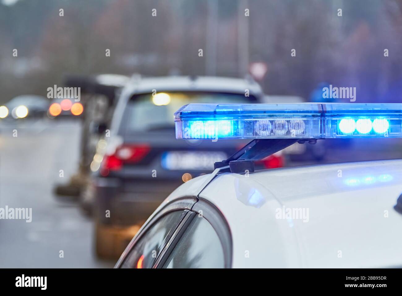 Police car blue lights on a car accident place Stock Photo Alamy