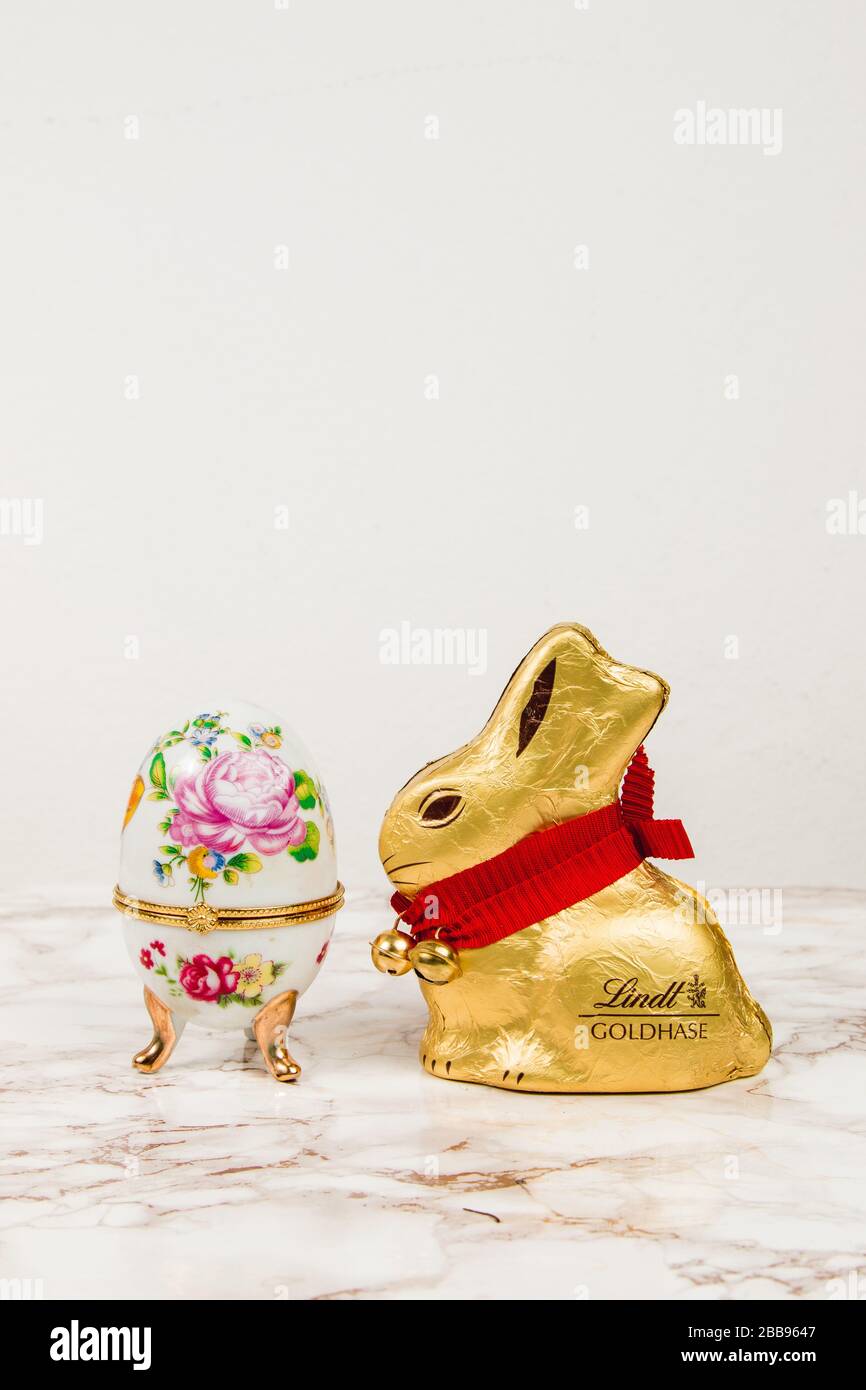 Luxury Easter egg with decorations on a marble background Stock Photo