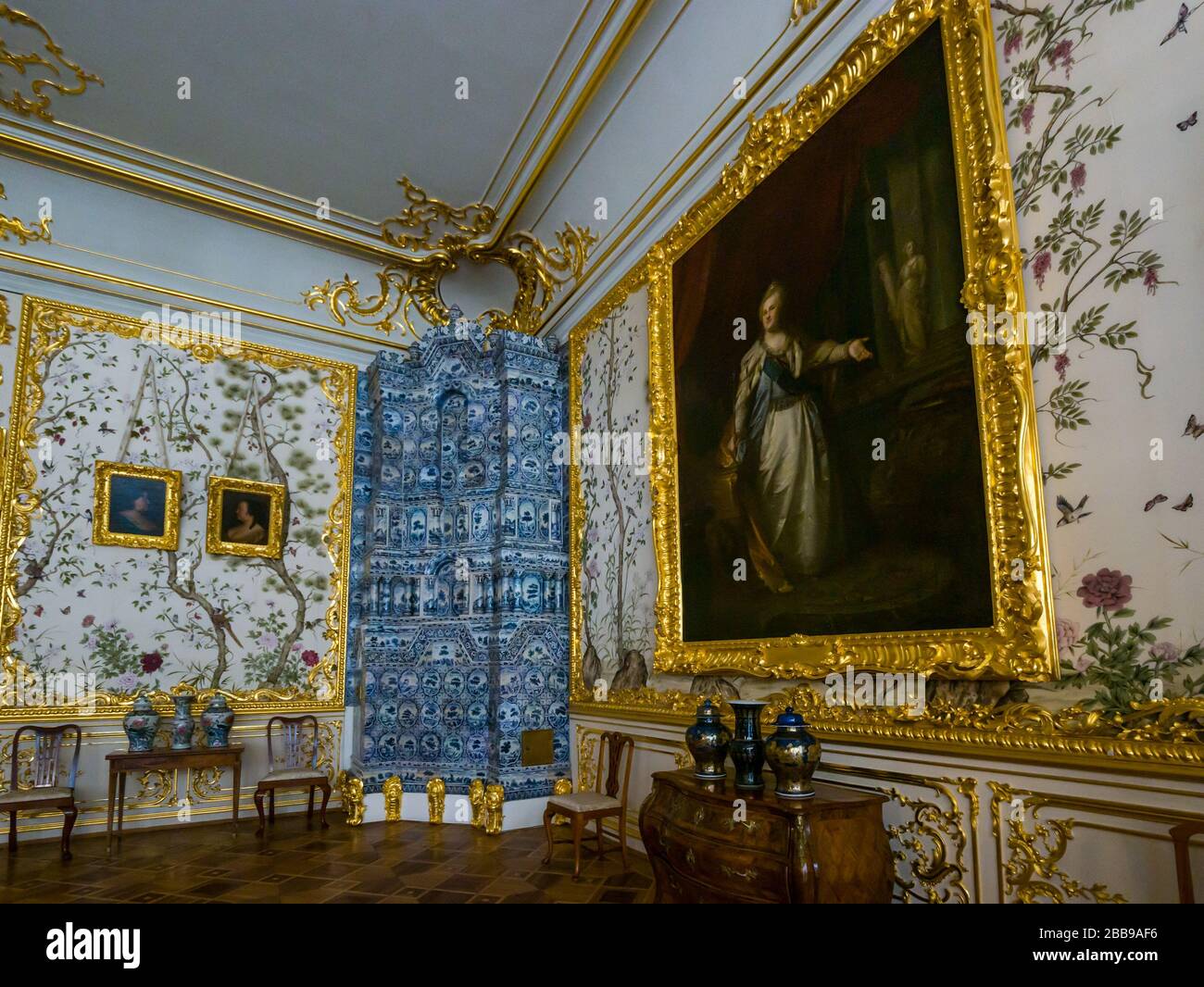 Ceramic heater and painting, Catherine Palace interior, Tsars Village, Pushkin, Tsarskoe Selo, Pushkin, Russian Federation Stock Photo