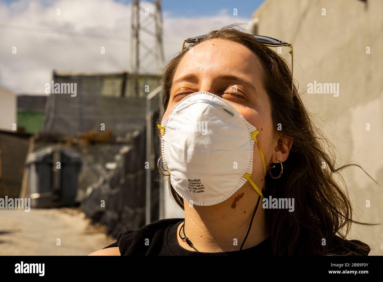 woman taking a sunbath wit a mask Stock Photo - Alamy