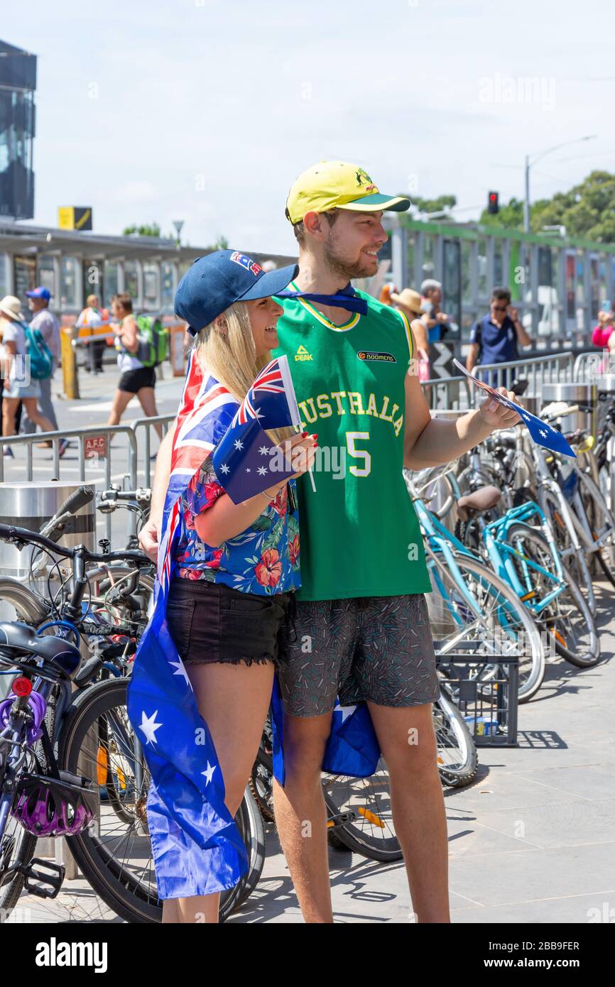 Young couple celebrating Australia Day, Swanston Street, City Central, Melbourne, Victoria, Australia Stock Photo