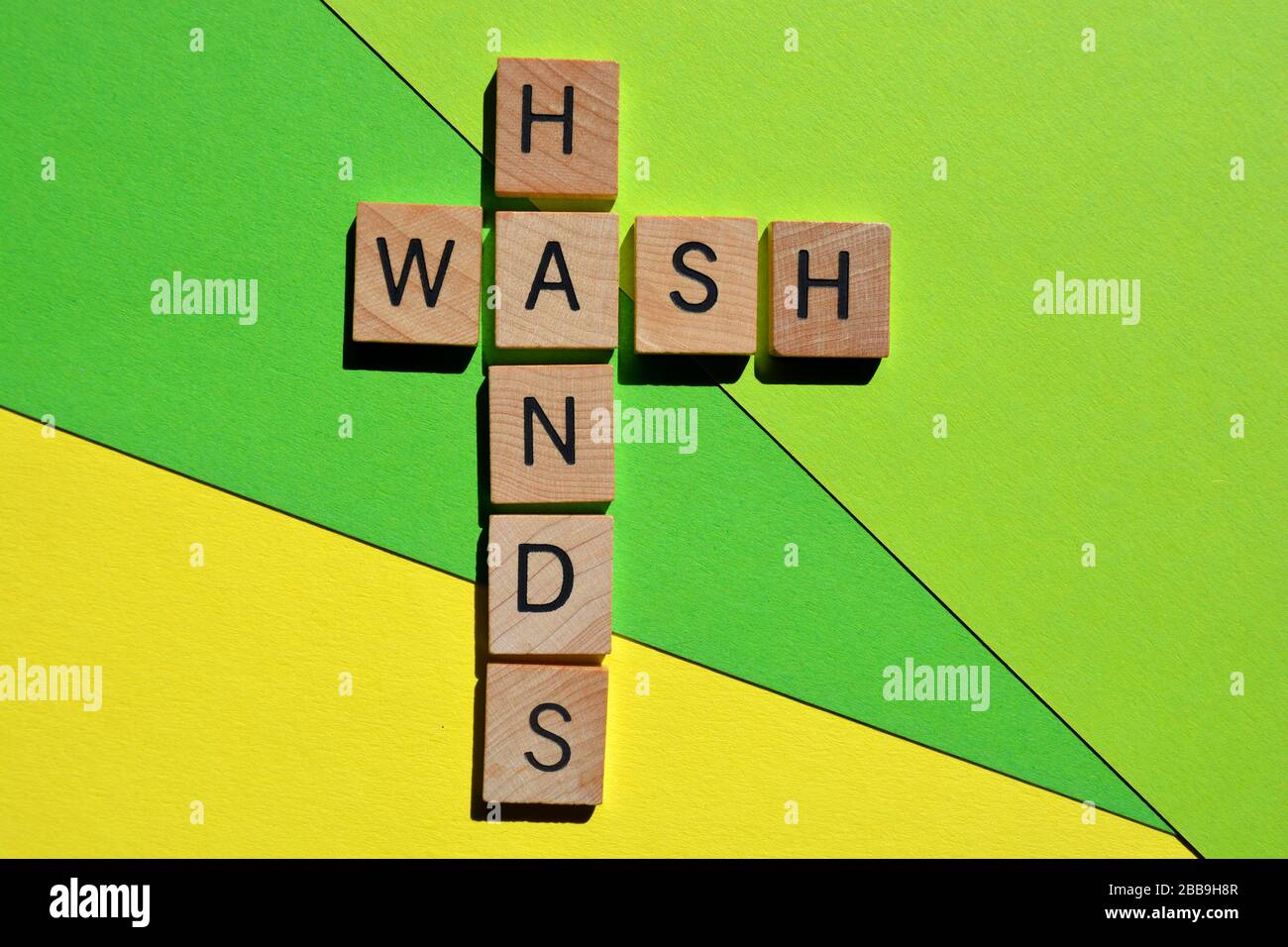 Wash Hands, words on green background Stock Photo
