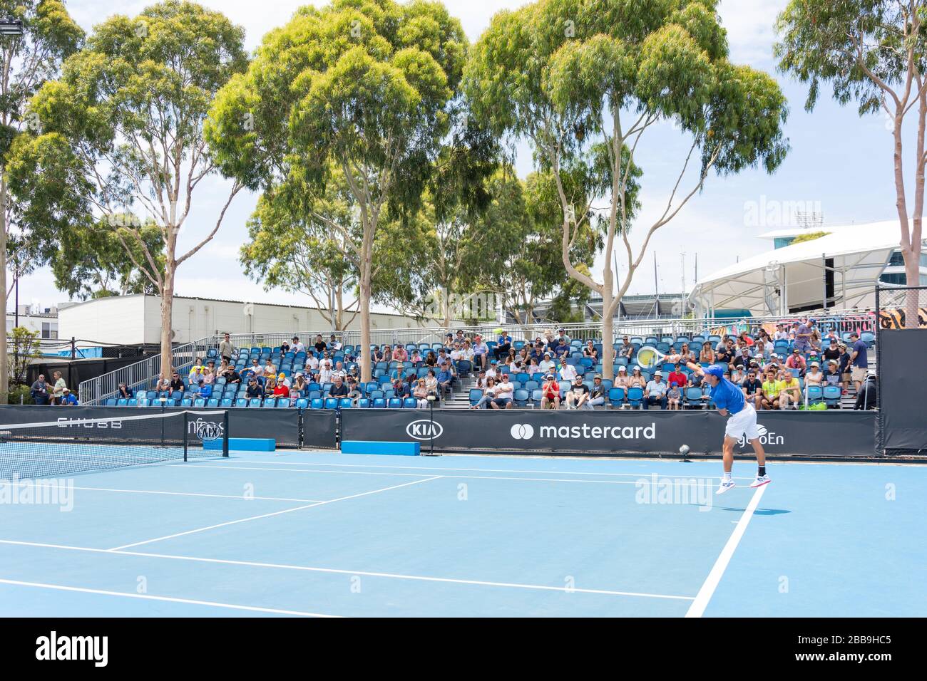 Junior player on Court 5 at Melbourne Open 2020 tennis tournament, City Central, Melbourne, Victoria, Australia Stock Photo