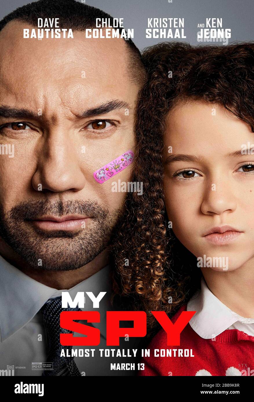 My Spy (2020) directed by Peter Segal and starring Dave Bautista, Chloe Coleman and Parisa Fitz-Henley. An undercover CIA agent is made by a 9 year old girl in the family he is keeping under surveillance. Stock Photo