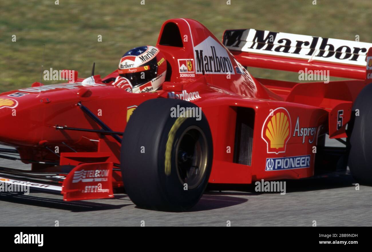 firo: Formula 1, season 1997 Sport, Motorsport, Formula 1, archive, archive pictures Team Ferrari (1996-2006) Michael Schumacher, Germany, was a Formula 1 driver from 1991 to 2006 and 2010 to 2012, Schumacher was 7, seven times, Formula 1, world champion, German national hero, brought Formula 1 after Germany, one of the largest Germans, 1st season at Ferrari Michael Schumacher, in the car | usage worldwide Stock Photo