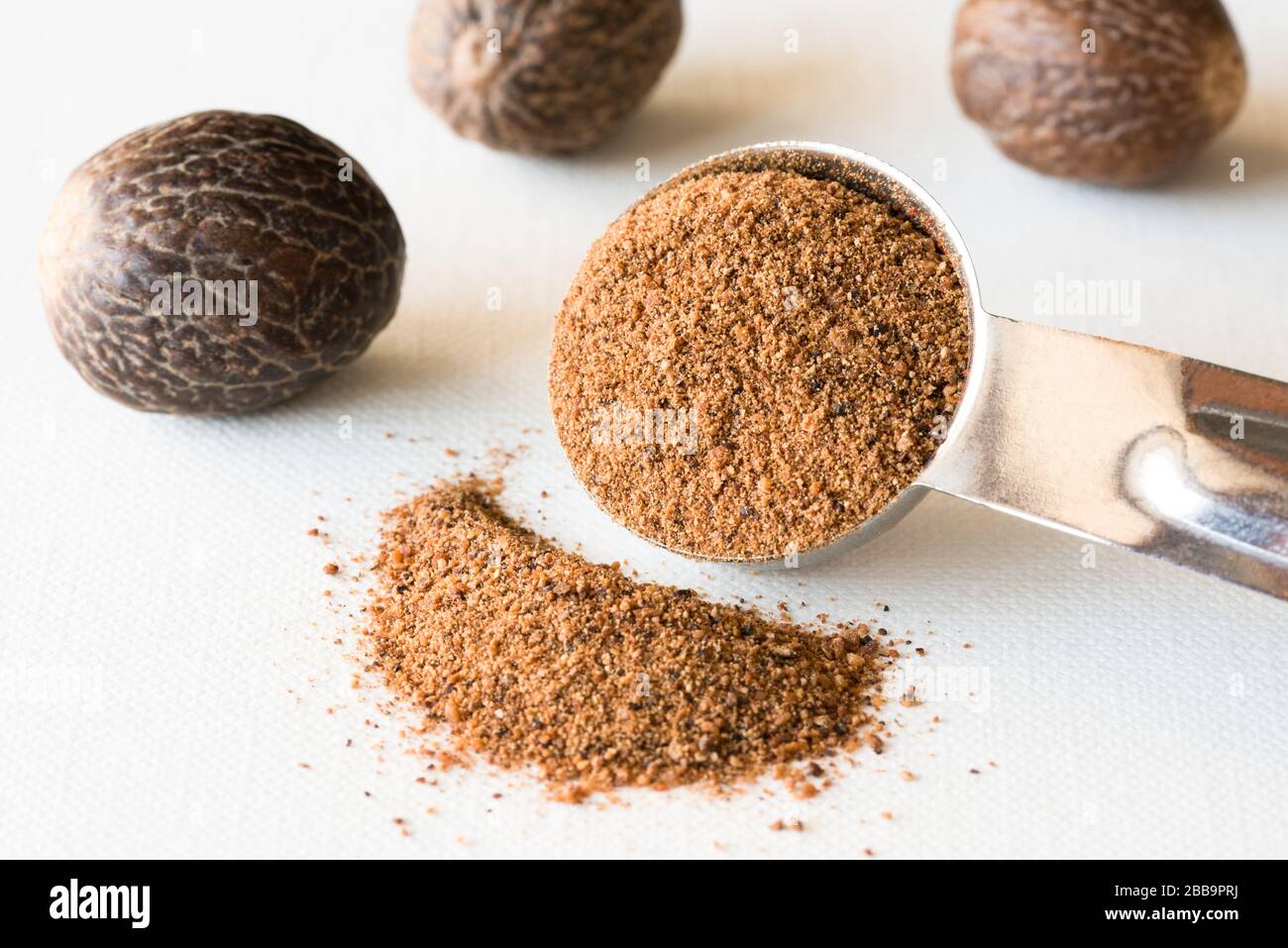 Ground Nutmeg Spilled from a Teaspoon Stock Photo Alamy
