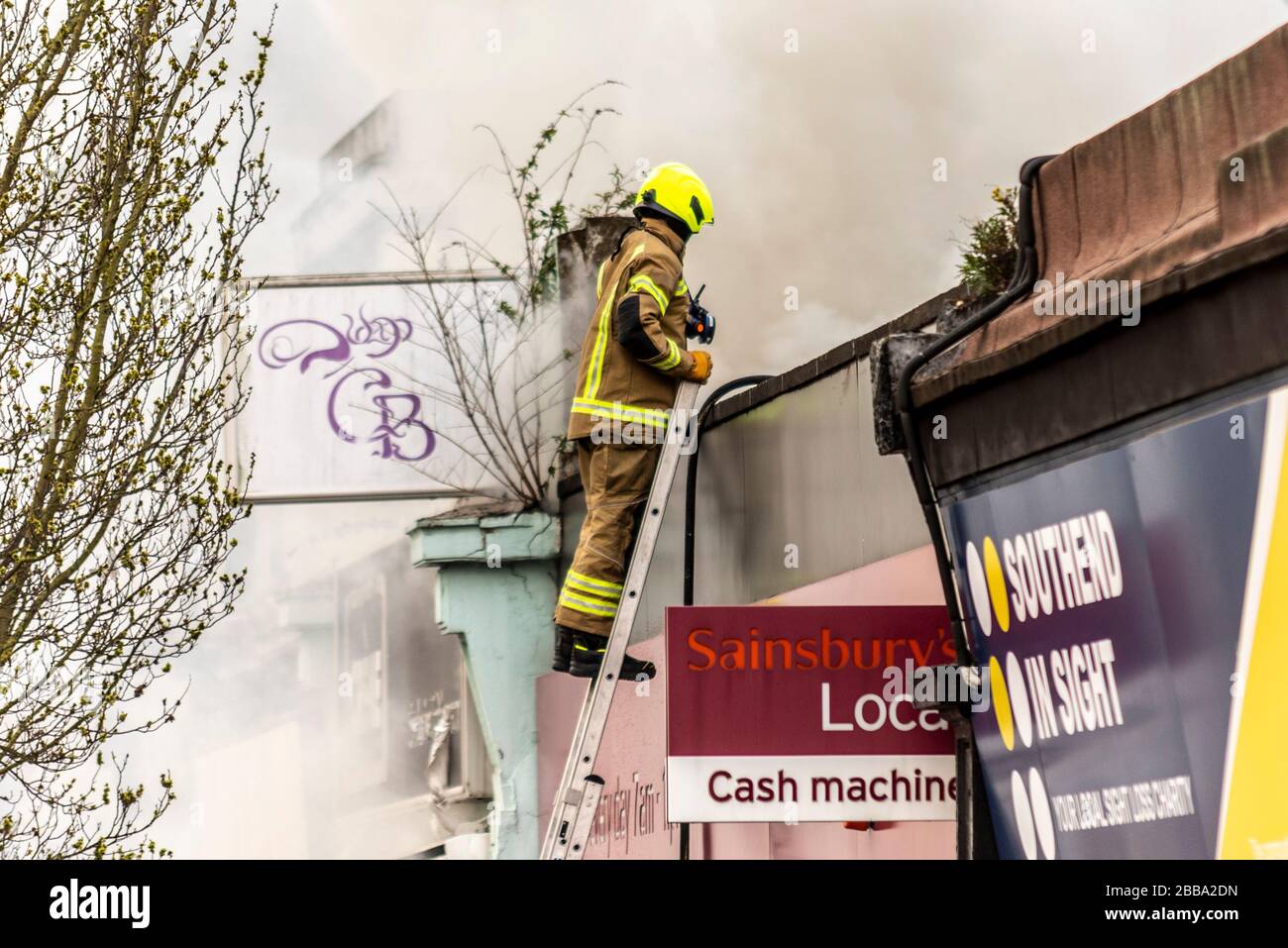 Fire Service dealing with a fire next to Sainsbury's supermarket in Westcliff on Sea, Essex, UK during COVID-19 lockdown. Cannabis plants discovered Stock Photo