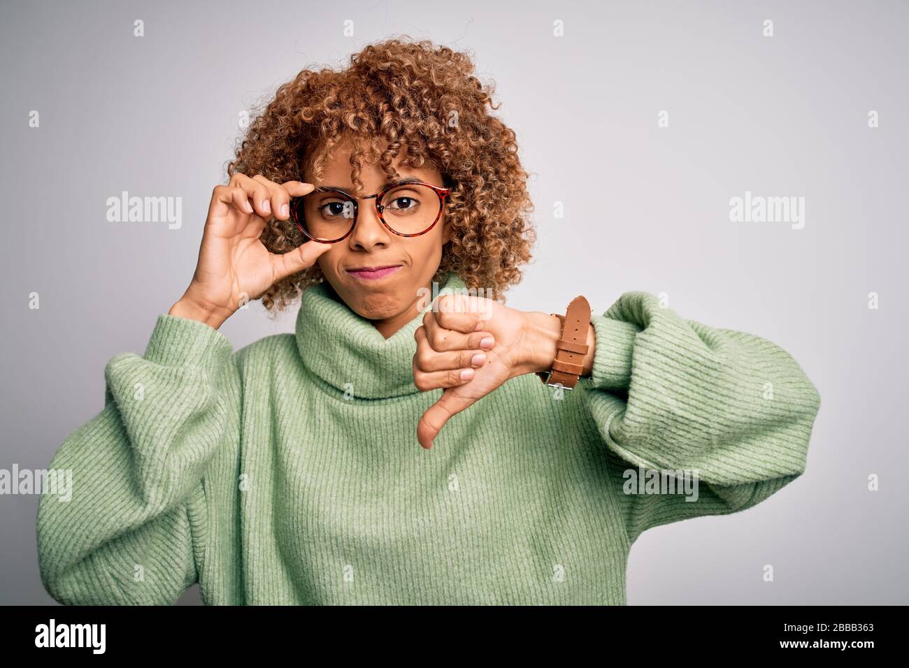 African american optical woman with curly hair wearing glasses over ...