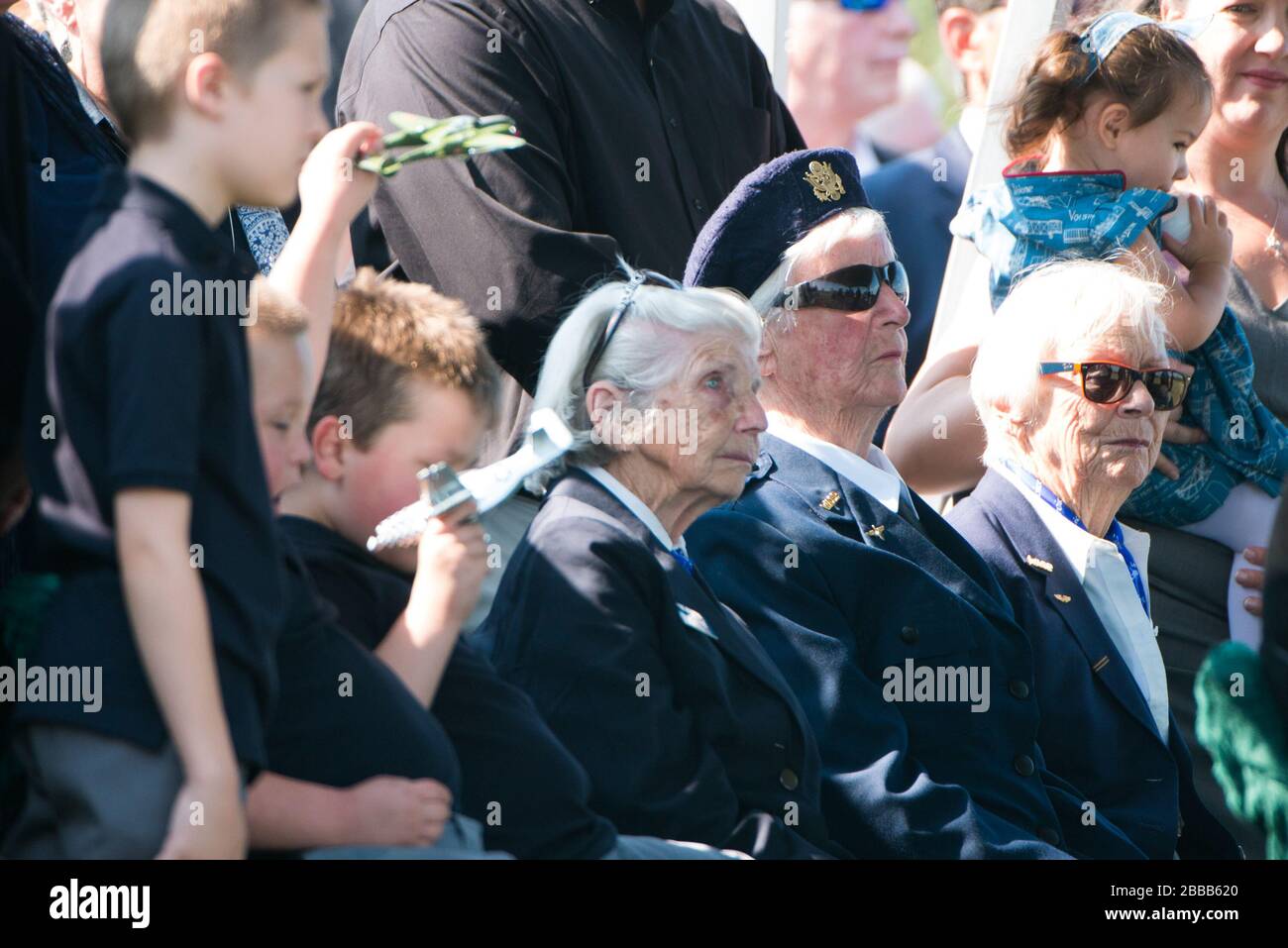 'Mourners attend the graveside service for United States Army Air Forces (Women Air Force Service Pilot) Florence Elaine Danforth Harmon in Arlington National Cemetery, Sept. 7, 2016, in Arlington, Va. Harmon was inurned in Columbarium Court 9. (U.S. Army photo by Rachel Larue/Arlington National Cemetery/released); 7 September 2016, 10:18; Graveside service for United States Army Air Forces (Women Air Force Service Pilot) Florence Elaine Danforth Harmon in Arlington National Cemetery; Arlington National Cemetery; ' Stock Photo