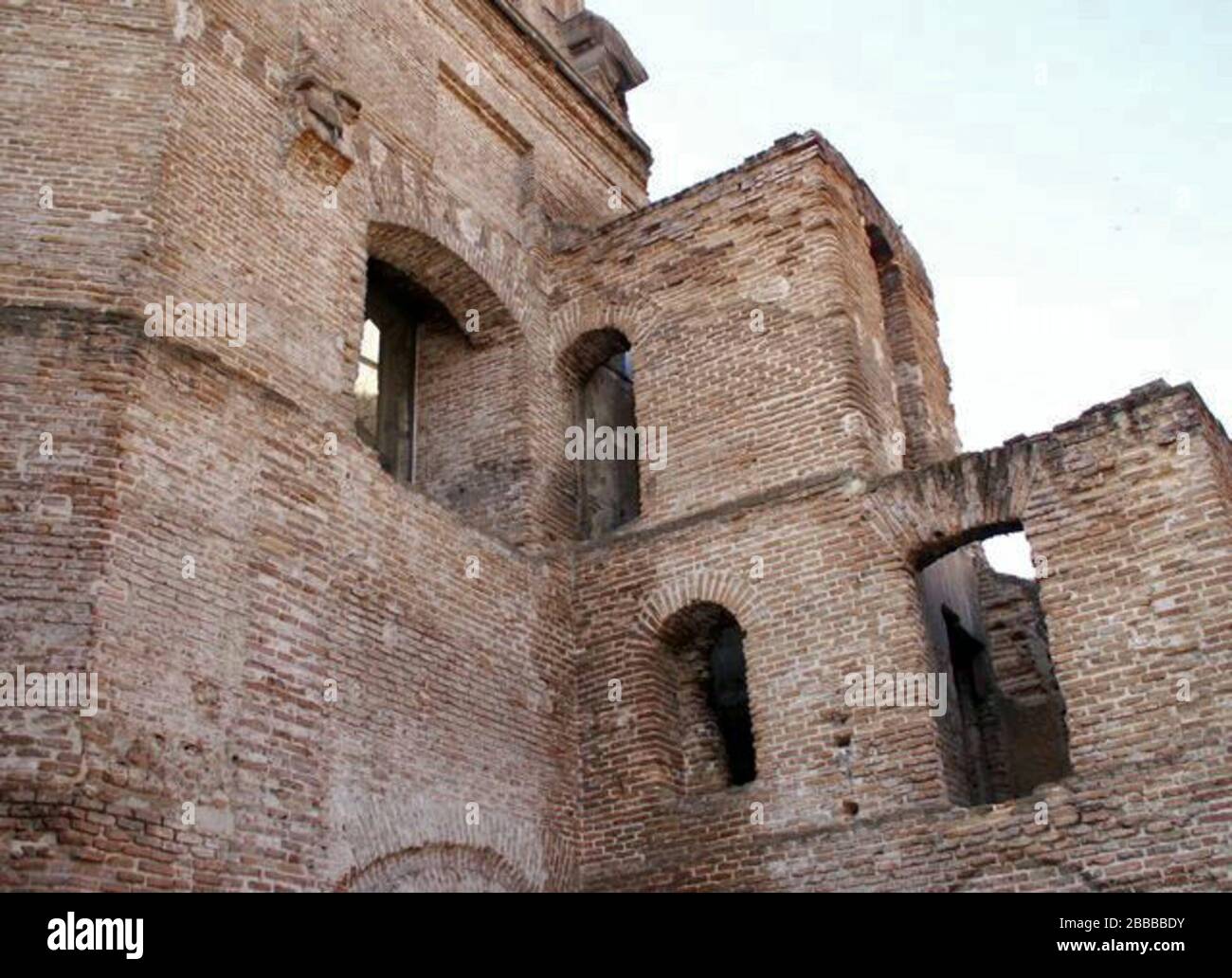"Español: Ruinas de la Iglesia del Colegio de las Escuelas Pías de San Fernando, Madrid. Construida entre 1763 y 1791. Fachada a la calle Sombrerete. Después de la Guerra Civil en parte del solar se levantó el Mercado de San Fernando. A principios del siglo XXI parcialmente rehabilitada para Biblioteca de la UNED.; 9 March 2007; Madripedia. Watermark (signature) in original picture removed by cropping and/or digital edition.; J.L. de Diego; " Stock Photo