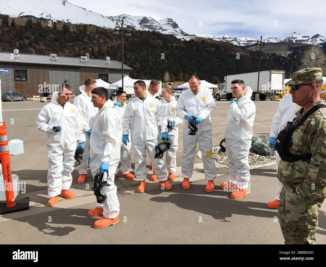 Members of the Colorado National Guard assist San Miguel County and the Colorado Department of Public Health & Environment with a COVID-19 drive-up testing station in Telluride, Colorado, March 17, 2020. The two specialized teams, 8th Weapons of Mass Destruction-Civil Support Team and Chemical, Biological, Radiological, Nuclear and high-yield Explosive Enhanced Response Force Package are Colorado’s resident trained and equipped experts in biological hazards. Colorado’s 8th WMD-CST and CERFP are available to the governor and Federal Emergency Management Agency Region Eight. (U.S. Army National Stock Photo