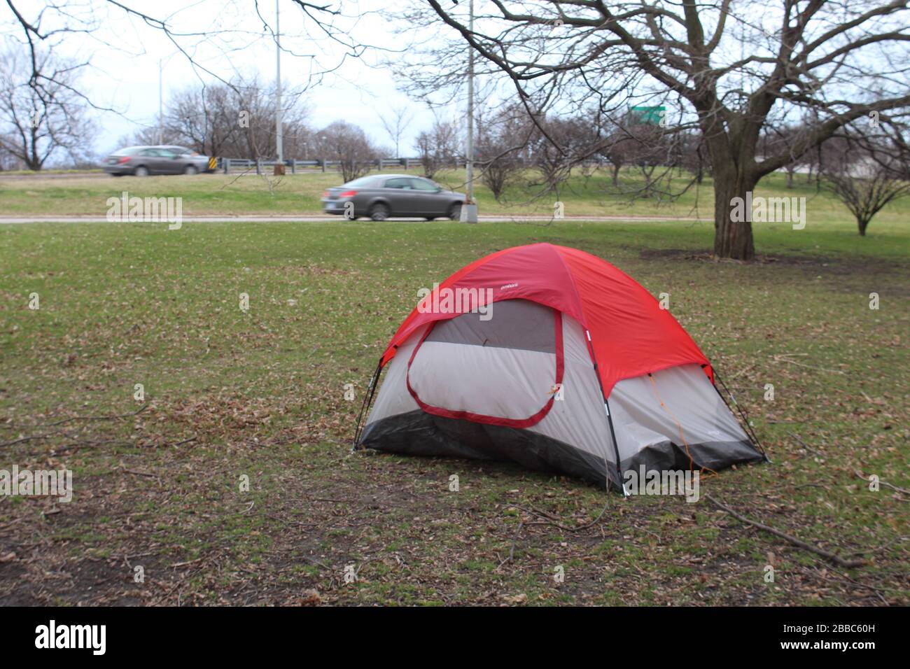 Homeless person's tent in Chicago's Lincoln Park next to Lake Shore Drive Stock Photo