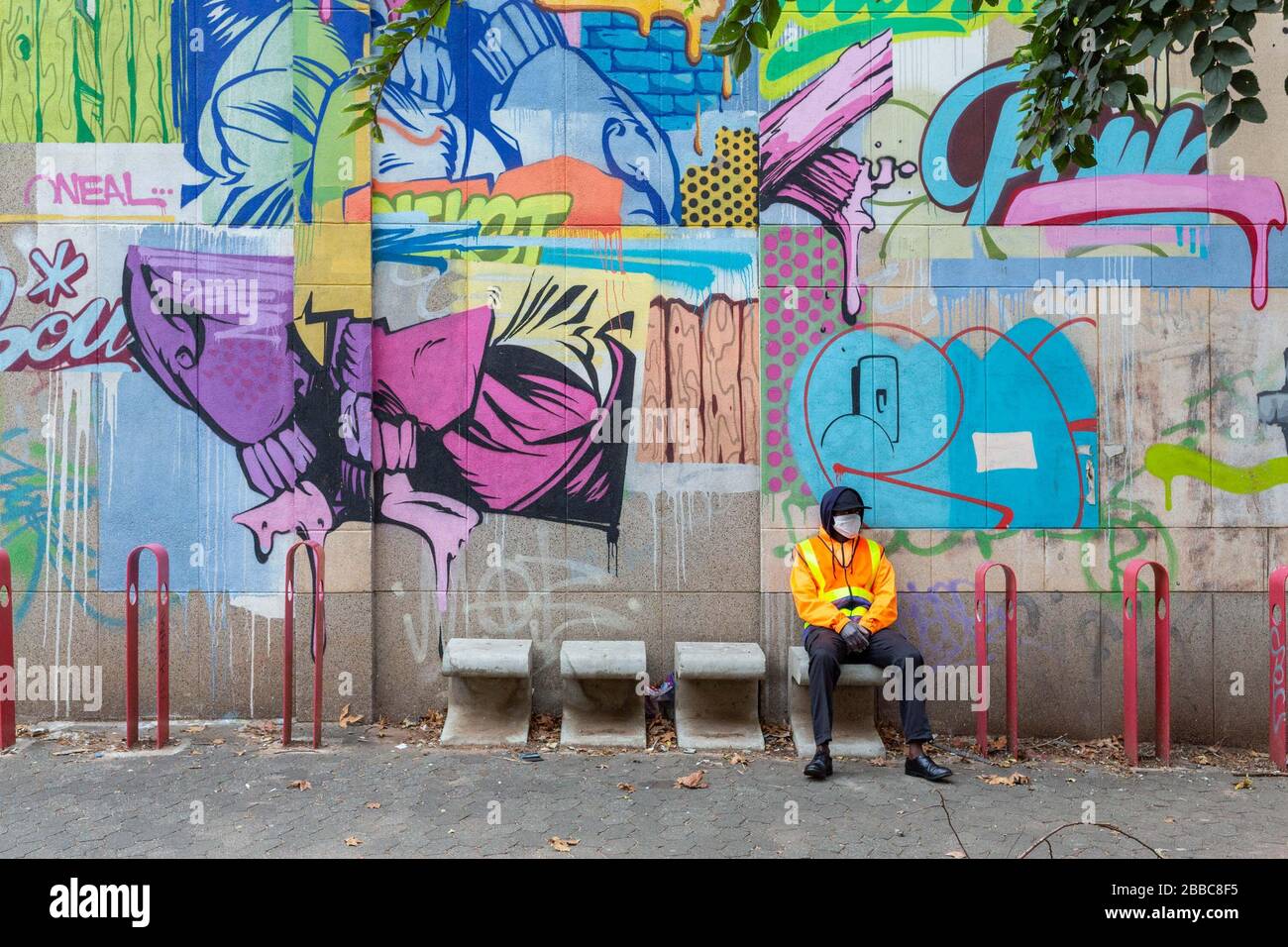 Johannesburg, South Africa. 30th Mar, 2020. A security guard sits on a