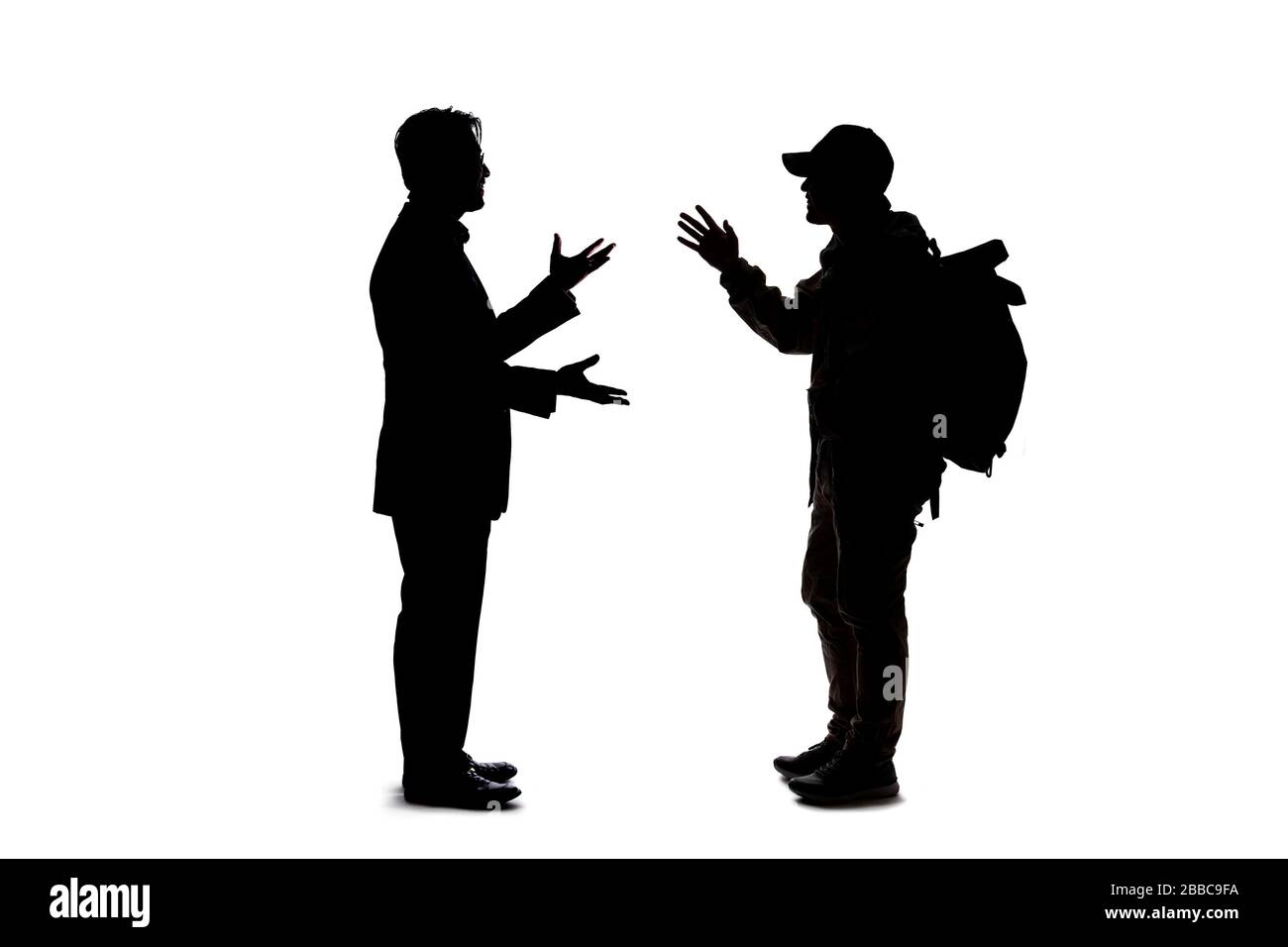 Two people standing social talking Cut Out Stock Images \u0026 Pictures - Alamy, image size:1300x956