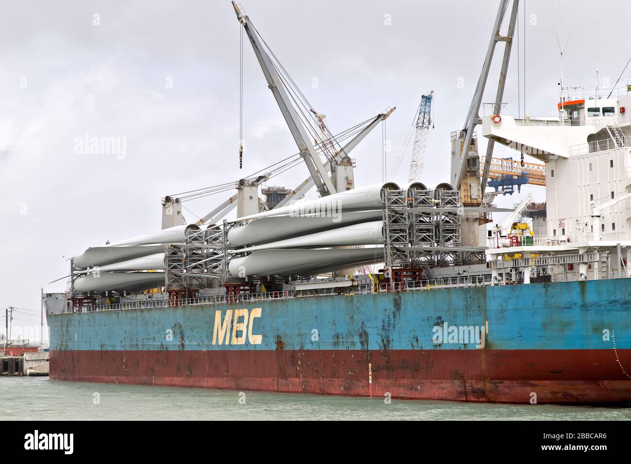 Giant Wind Turbine Propeller Blades preparing to offload  from freighter,   Port Aransas, Texas, Stock Photo