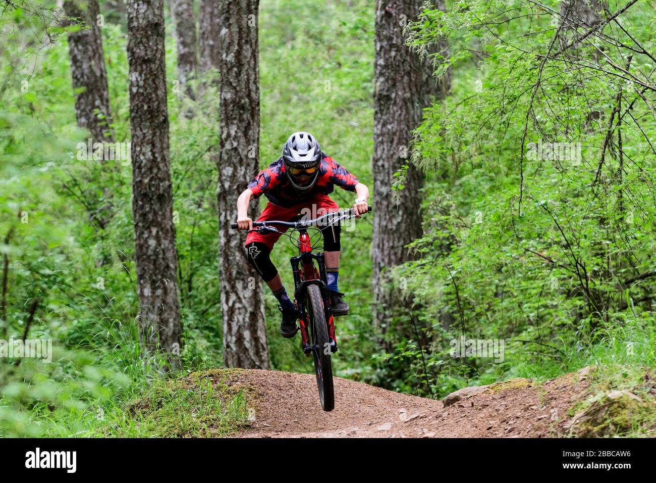 Mountain bikers on the Double D course during the 2019 Mt. Tzouhalem Enduro Event on Mt. Tzouhalem in Duncan, British Columbia. Stock Photo