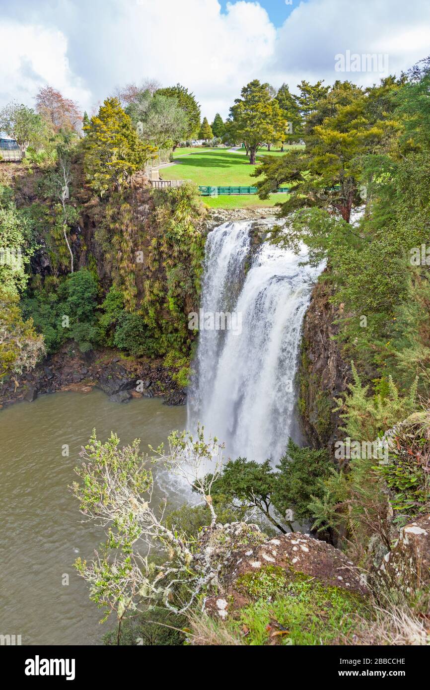 Whangarei Falls in the Whangarei Scenic Reserve in North Island, New Zealand. The classic curtain waterfall is part of the Hatea River. Stock Photo