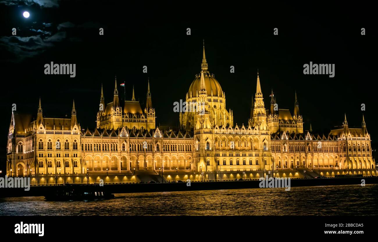 Full moon over Parliament, Budapest, Hungary danube river night Stock Photo