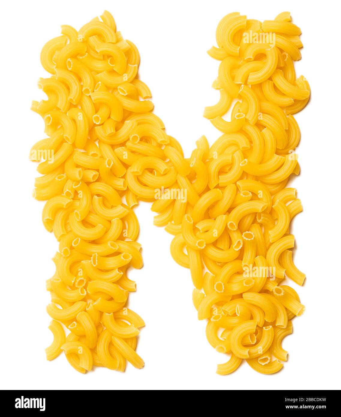 Letter N of the English alphabet from dry pasta on a white isolated  background. Food pattern made from macaroni. Bright alphabet for shops  Stock Photo - Alamy