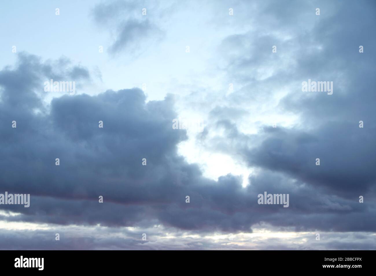 Lovely white fluffy clouds on a background of blue sky Stock Photo - Alamy