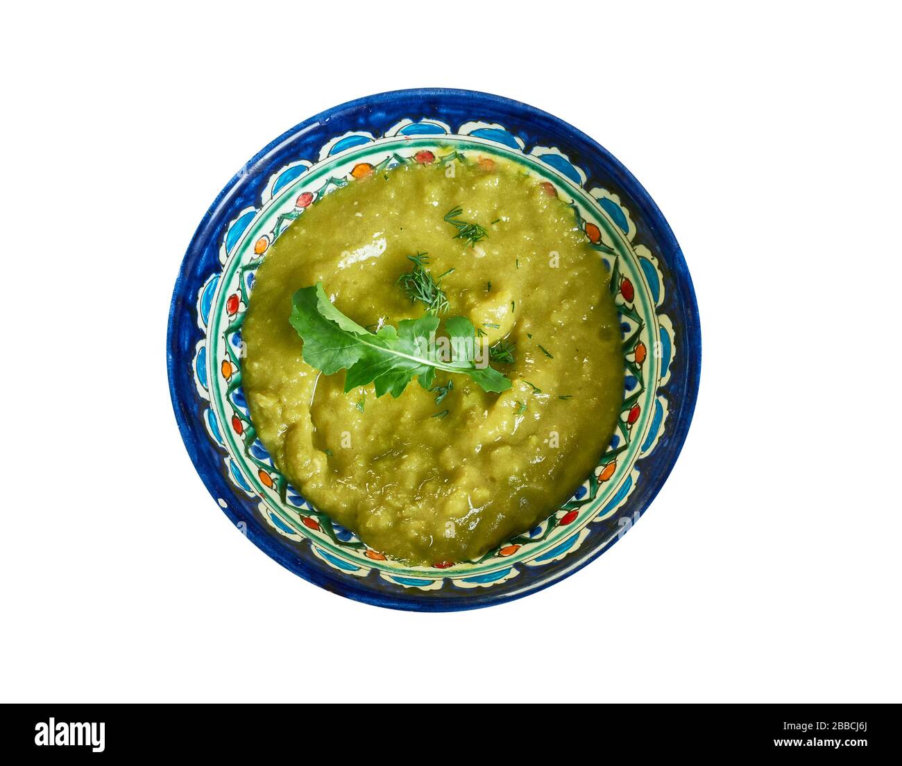 Spiced spinach dhal soup, Indian lentil soup. Stock Photo