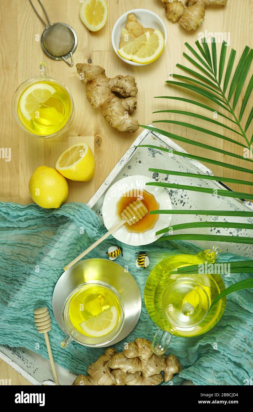 Ginger and lemon herbal tea preparation flat lay, with its high levels