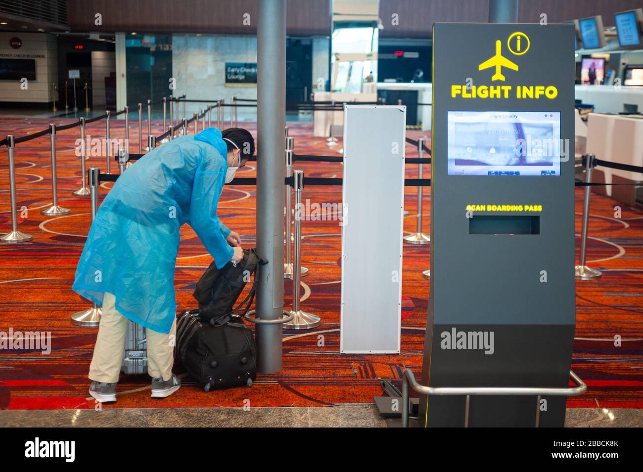 28.03.2020, Singapore, Republic of Singapore, Asia A passenger at