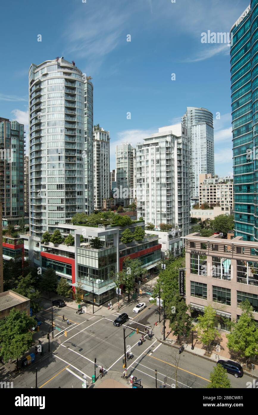 The intersection of Robson Street and Hamilton Street in downtown Vancouver, British Columbia, Canada. Stock Photo