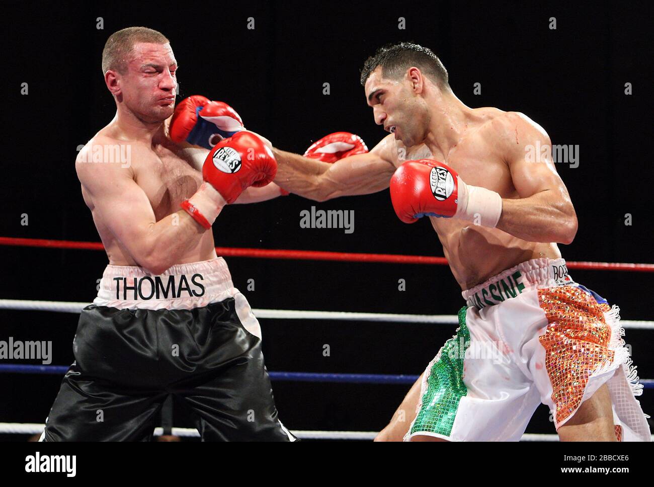 Yassine El Maachi (white/gold/green shorts) defeats Thomas Grublys in a