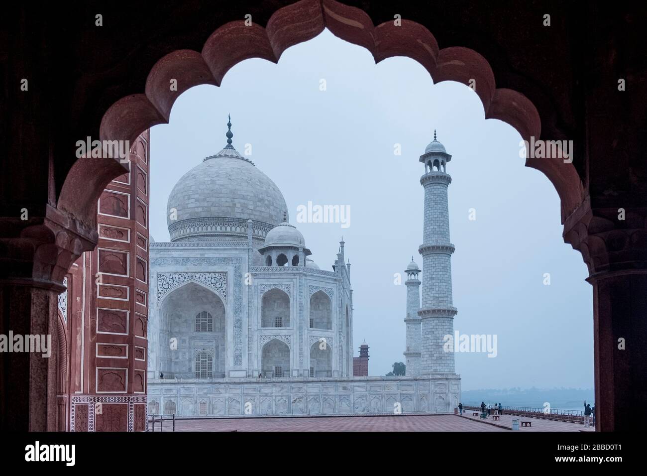 Taj Mahal through a arched gate Stock Photo
