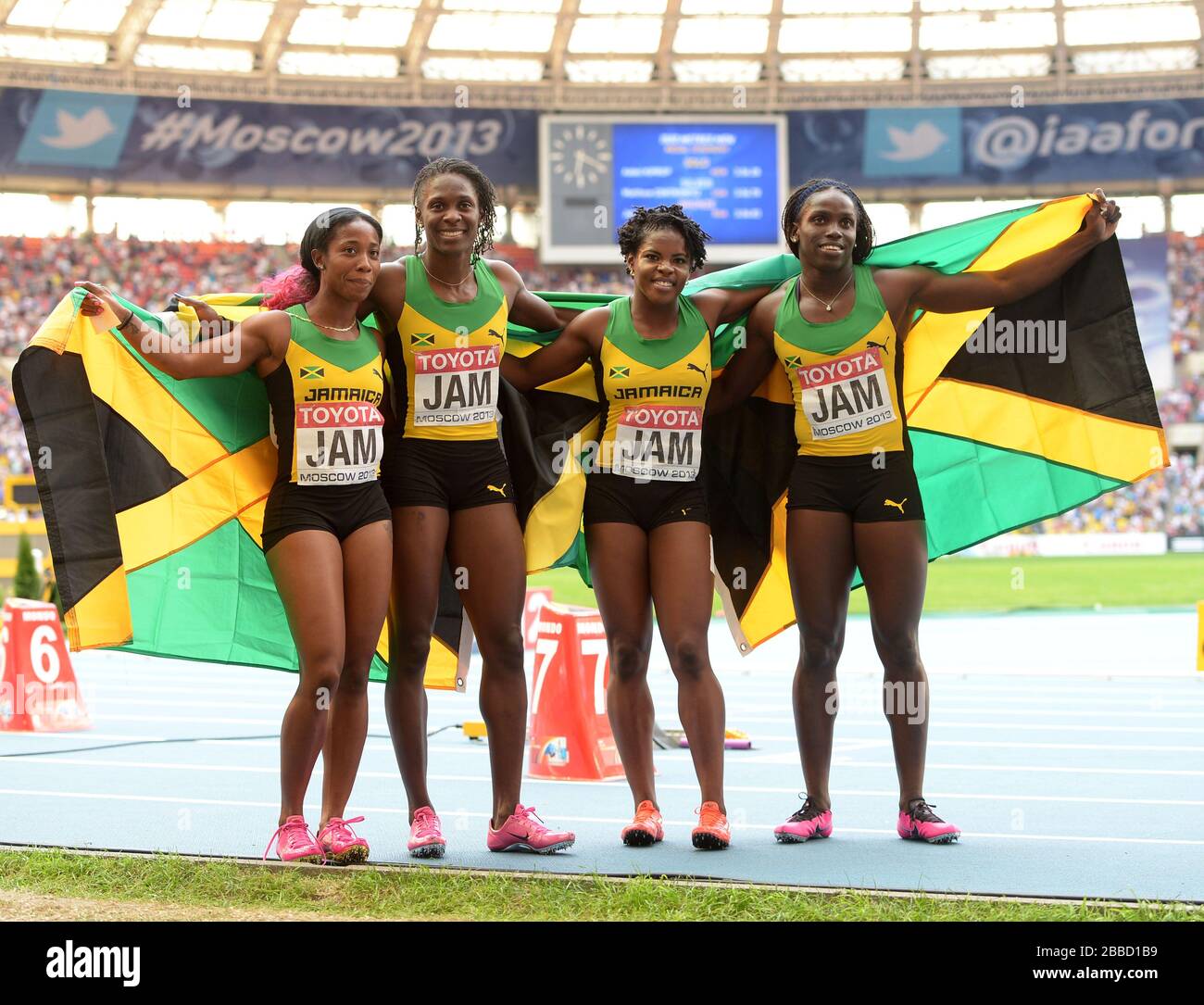 Jamaica's Shelly-Ann Fraser-Pryce, Kerron Stewart, Schillonie Calvert and Carrie Russell celebrate winning Gold in the Women's 4x100m Relay during day nine of the 2013 IAAF World Athletics Championships at the Luzhniki Stadium in Moscow, Russia. Stock Photo