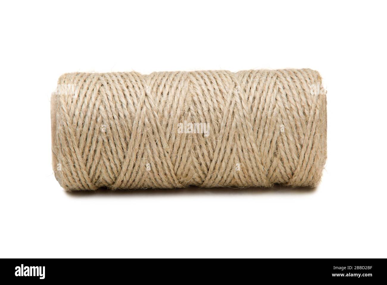 image of a thick thread wound into a spool on a white background Stock  Photo - Alamy