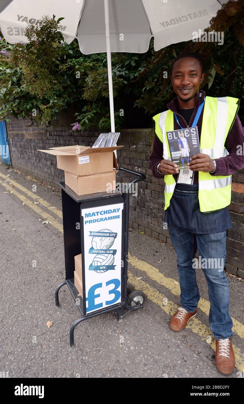Programme Seller A programme seller outside St Andrew's Stock Photo - Alamy