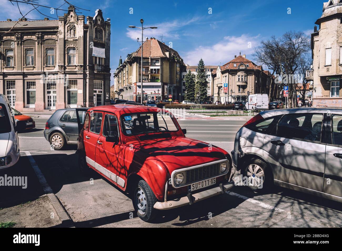 Parked Retro Red Car in Serbia Stock Photo
