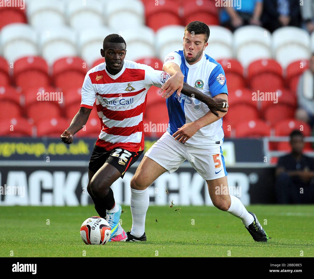 Doncaster Rovers' Theo Robinson (left) and Blackburn Rovers' Grant ...