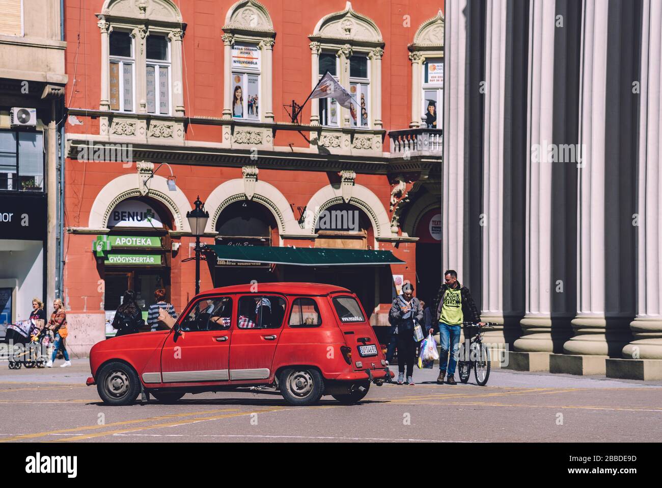 Retro Red Car on Main Square Stock Photo