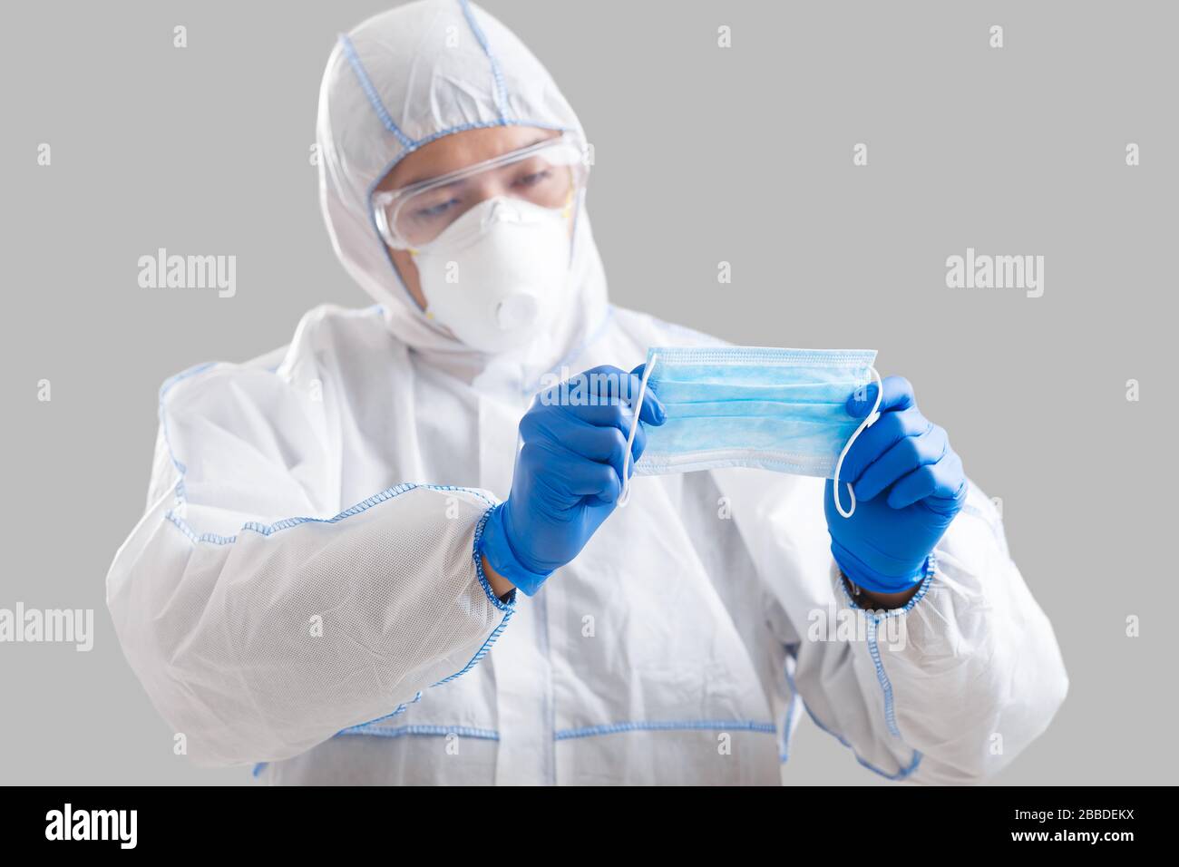 Asian male doctor looks hi-res stock photography and images - Alamy