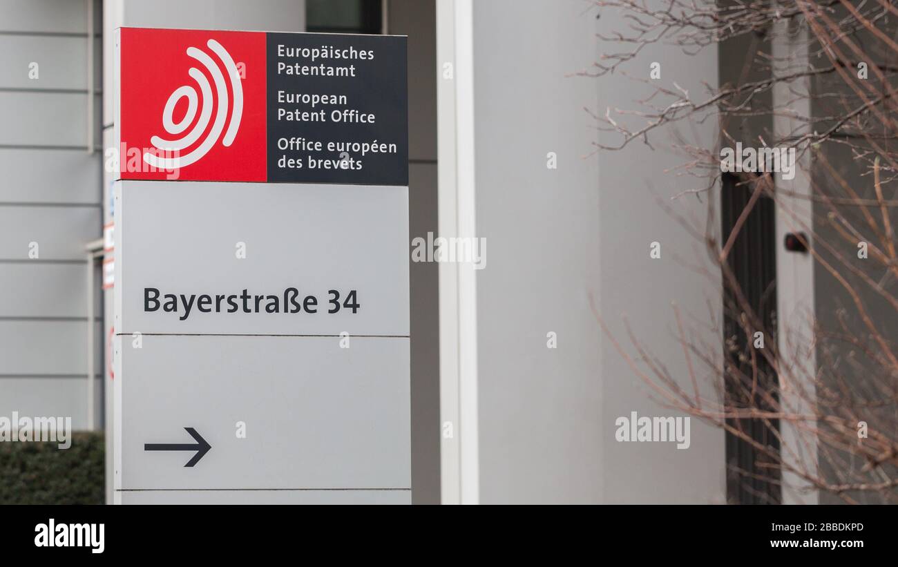 Signpost in front of the European Patent Office (EPO) Headquarters at Bayerstraße. With an arrow pointing towards the entrance. Patent registration. Stock Photo